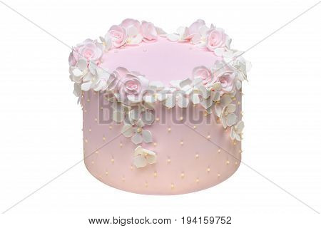 Light pink cake with flowers isolated on white background