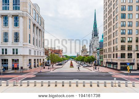 Harrisburg USA - May 24 2017: Pennsylvania capital city exterior cityscape or skyline by capitol with famous church and street