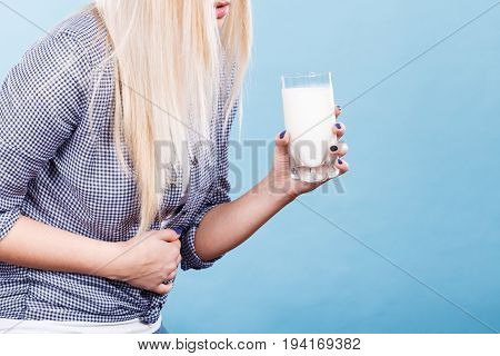 Woman Holding Milk Glass Having Stomach Ache