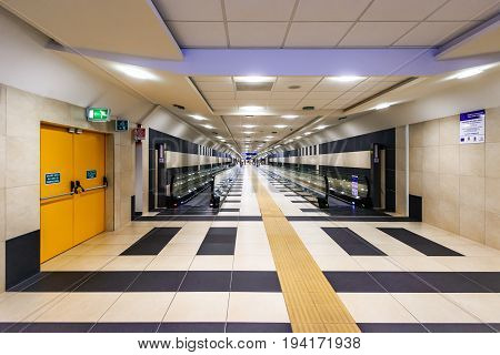 BARI ITALY - JULY 09 2015: Moving escalator conveyor at Karol Wojtyla Airport in Bari.