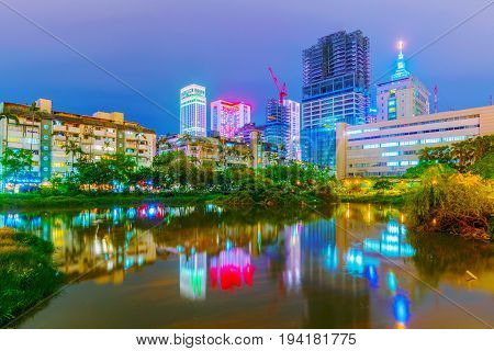 TAIPEI TAIWAN - MAY 26: This is lakeside view of Xinyi financial district taken from Songshan cultural and creative park on May 26 2017 in Taipei