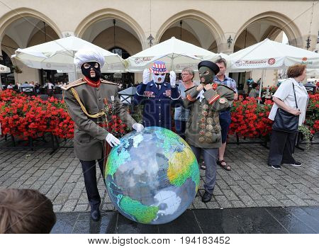 CRACOW POLAND - JULY 5 2017: 30th Street - International Festival of Street Theaters in Cracow Poland. An Odyssey Towards New Shores - a street parade