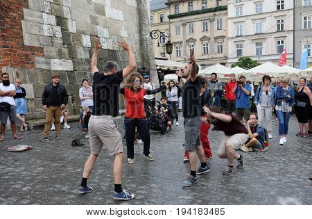 CRACOW POLAND - JULY 5 2017: 30th Street - International Festival of Street Theaters in Cracow Poland. An Odyssey Towards New Shores - a street parade