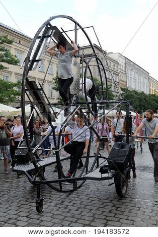 CRACOW POLAND - JULY 5 2017: 30th Street - International Festival of Street Theaters in Cracow Poland. An Odyssey Towards New Shores - a street parade