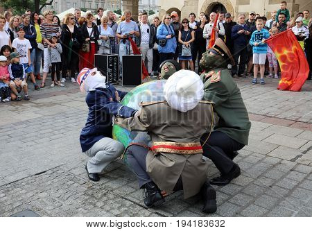 CRACOW POLAND - JULY 5 2017: 30th Street - International Festival of Street Theaters in Cracow Poland. An Odyssey Towards New Shores - a street parade