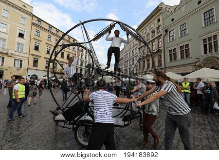 CRACOW POLAND - JULY 5 2017: 30th Street - International Festival of Street Theaters in Cracow Poland. An Odyssey Towards New Shores - a street parade