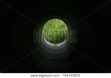 Tunnel Pipe  - Exit To Nature. Concept Of Psichology, Phylosophy Or Ecology Theme.
