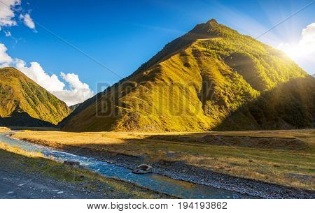 Breathtaking scene of the main Caucasus ridge. Location place Location place Sno village - foot of Mt. Kazbegi, Georgia country, Europe. Wonderful image of wallpaper. Explore the world's beauty.