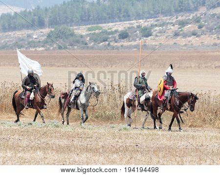 Tiberias Israel July 01 2017 : Participants in the reconstruction of Horns of Hattin battle in 1187 left the camp on horseback and ride go to the battle site near TIberias Israel