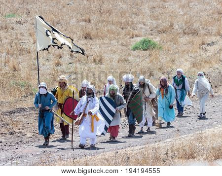 Tiberias Israel July 01 2017 : Participants in the reconstruction of Horns of Hattin battle in 1187 left the camp on foot and go to the battle site near TIberias Israel