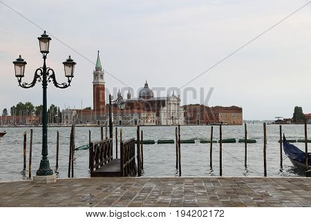Gondolas and Chiesa di San Giorgio Maggiore, San Marco square in Venice, Italy