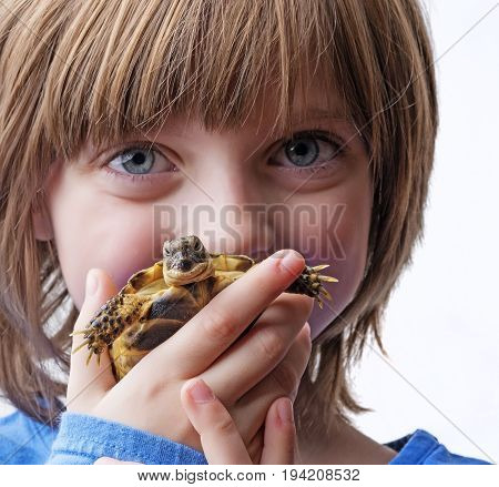 little girl with her pet - tortoise