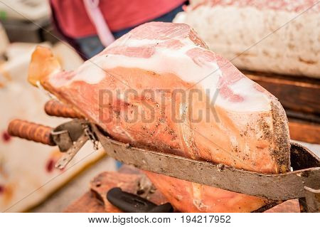 Raw Ham In The Vise Ready To Be Sliced.