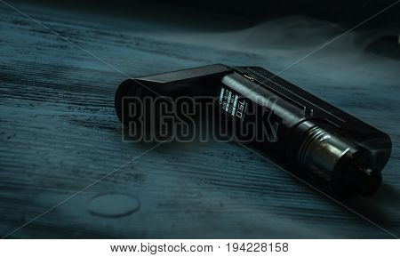 Vaporizer On A Blue Background