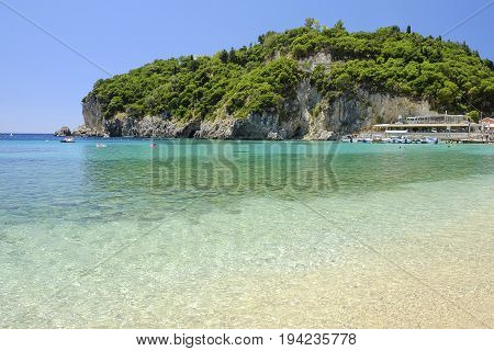 View on the bay and beach Paleokastritsa with crystal sea water on the Island Corfu Greece.