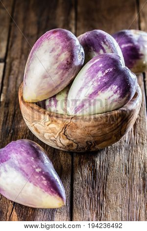 South American fruit sweet cucumber. Pepino dulce or pepino melon on wooden background