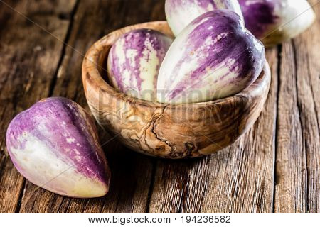 South American fruit sweet cucumber. Pepino dulce or pepino melon on wooden background