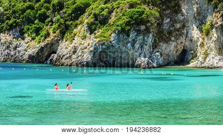 PALEOKASTRITSA CORFU GREECE - JULY 3 2017: Aerial view on the bay and beach Palaiokastritsa with crystal sea water on the Island Corfu Greece.
