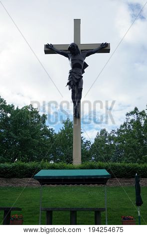 INDIAN RIVER, MICHIGAN / UNITED STATES - JUNE 18, 2017: The Cross in the Woods Roman Catholic National Shrine features the world's largest crucifix.