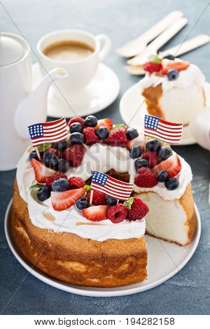 Angel food cake with whipped cream and fresh berries