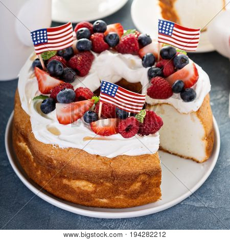 Angel food cake with whipped cream and fresh berries