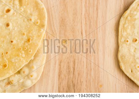 Flat Bread On A Wooden Background