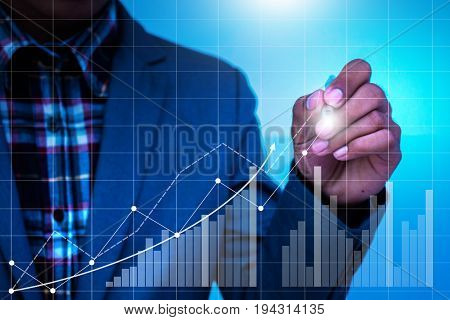 Businessman hand working with new modern computer and business strategy.