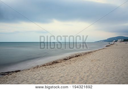 The Black Sea Shore From Albena, Bulgaria With Golden Sands, Sun, Blue Mystic Water, Umbrellas And S