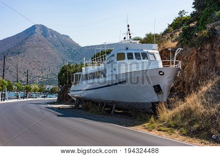Broken Boat At Elounda Coast Of Crete Island In Greece