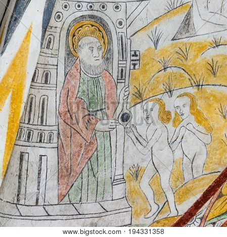 Saint Peter with the Keys of the Kingdom a medieval gothic fresco in Vinderslev church Denmark June 22 2017