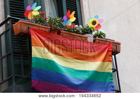 Rainbow flags to celebrate gay pride day in Madrid decorating facades and balconies in the city