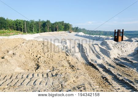 Extraction Of Sand From A Sand Pit. Iron Technological Constructions. Exavation Machine Excavator At