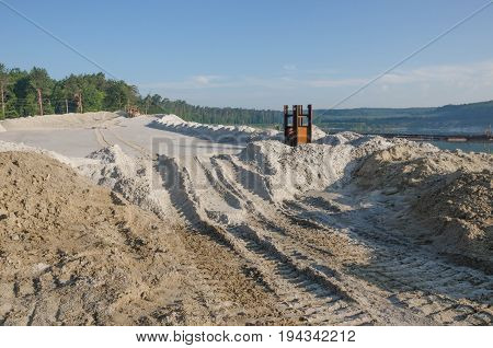 Extraction Of Sand From A Sand Pit. Iron Technological Constructions. Exavation Machine Excavator At