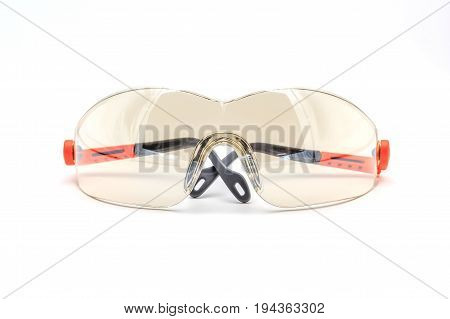 Plastic safety goggles on a white background with clipping path Safety equipment