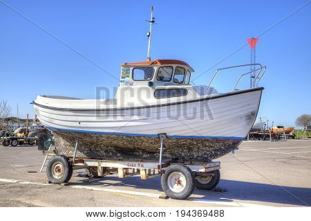 Drager Denmark - May 02.2013: Small boat on the winter quarters before lowering on water