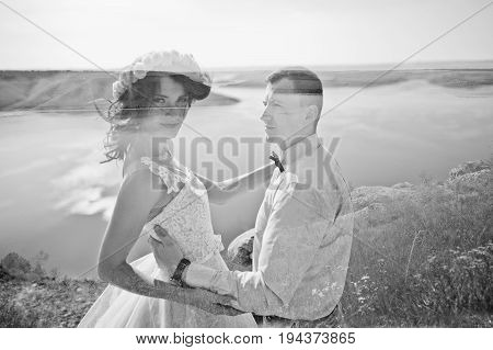 Lomographic Photo Of The Wedding Couple Hugging. Black And White.