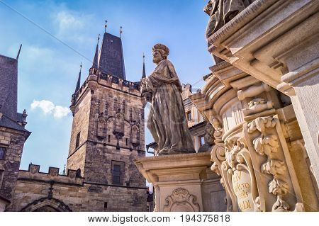 Statue Of Saint Near Charles Brigde Against Blue Sky