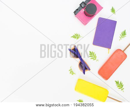 Summer background. Pink retro camera bright sunglasses ice cream. Flat lay top view.