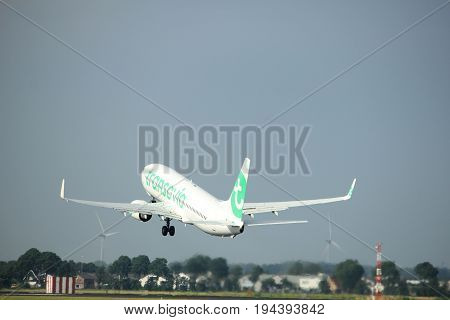 Amsterdam the Netherlands - July 6th 2017: PH-HZE Transavia Boeing 737-800 takeoff from Polderbaan runway Amsterdam Schiphol Airport