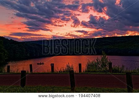 A cloudy sunset at Locust Lake State Park Schuylkill County Pennsylvania USA.