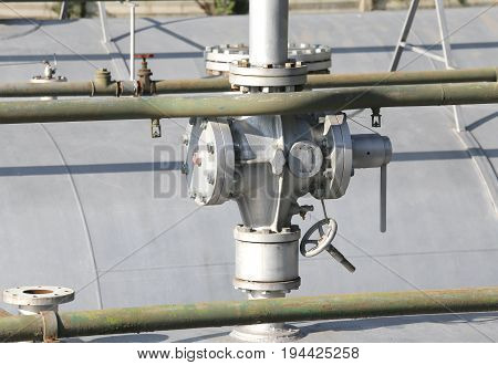 Huge Valve Over The Big Gas Cylinder