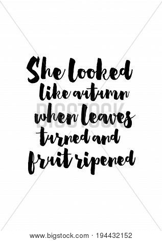 Handwritten calligraphy quote and autumn motives. She looked like autumn, when leaves turned and fruit ripened.