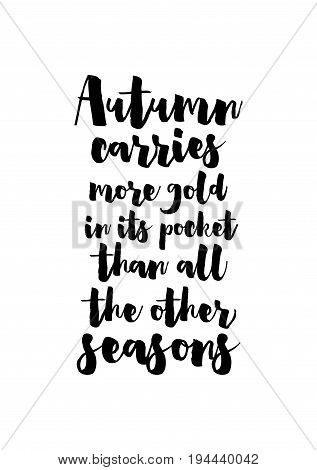 Handwritten calligraphy quote and autumn motives. Autumn carries more gold in its pocket than all the other seasons.