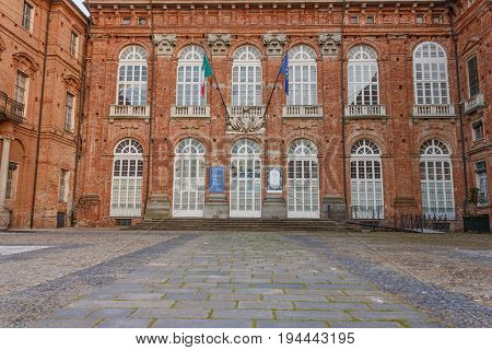 The castle at the extent and belongs to the heritage site list Unesco / AGLIE,TURIN/ITALY-CIRCA AUGUST 2016:Castle of Aglie and its entrance staircase on August 2016,in Aglie.