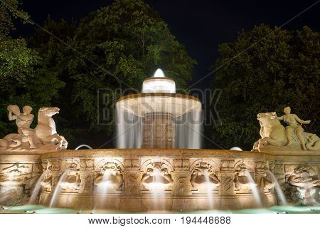 The Famous Fountain Wittelsbach At Night. Munich, Bavaria, Germany.