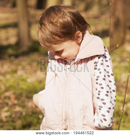 Beautiful baby girl ashamed ashamed embarrassed confused pose. (Body language gestures facial expressions psychology concept)