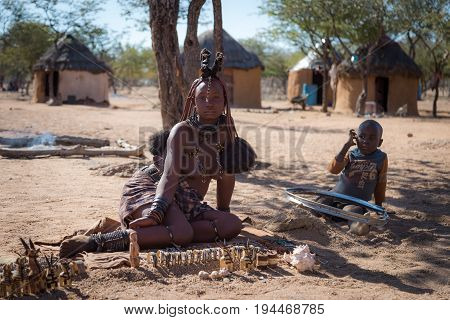 Kamanjab, Namibia - 28 May 2017: Himba Tribe Woman With Ornaments On The Neck In The Village Of Himb