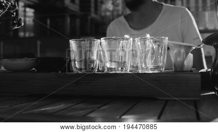 Glass Pialas At The Tea Ceremony Close-up. Transparent Bowls For Drinking Chinese Large-leaf Tea. Te