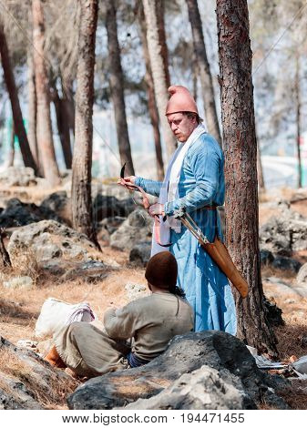 Tiberias Israel July 01 2017 : Participants in the reconstruction of Horns of Hattin battle in 1187 talk in the camp before the campaign near TIberias Israel