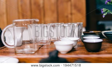 Glass Pialas At The Tea Ceremony Close-up. Transparent Bowls For Drinking Chinese Large-leaf Tea. Te